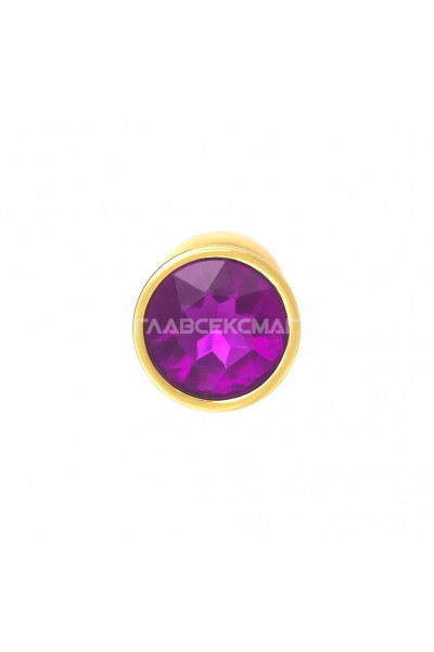 Золотистая анальная пробка с фиолетовым кристаллом - 7 см. Золотистая анальная пробка с фиолетовым кристаллом - 7 см.
